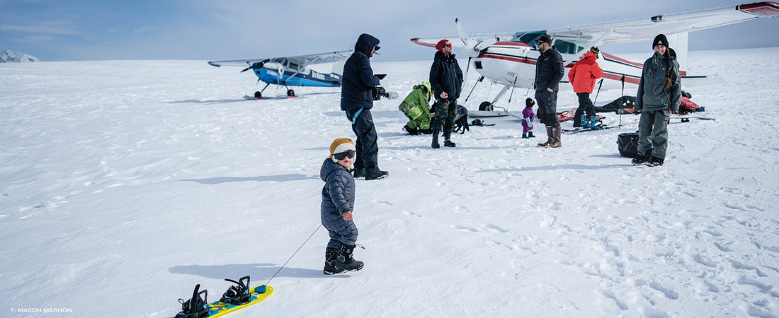 The crew enjoying some quality family time in the mountains after Malone Mashon, age 2, potentially became the youngest snowboarder ever to complete an Alaskan first descent. Photo: Mason Mashon