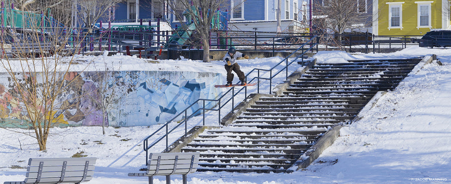 Brandon Fain boardsliding an iconic Rhode Island rail for Less Sex, More Surf. Photo: Jacob Manning