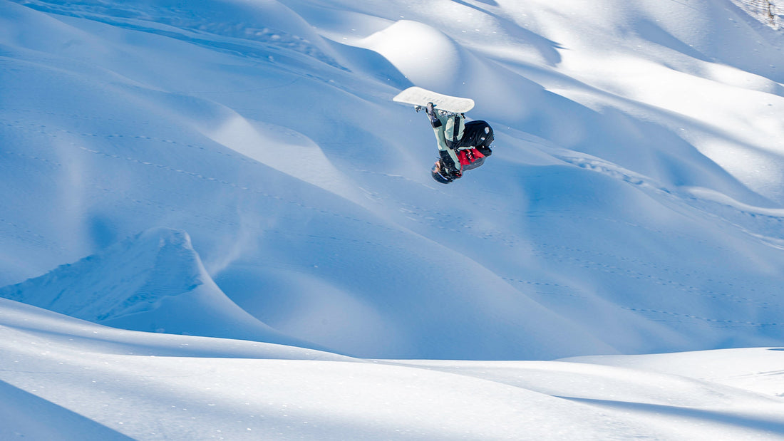 Estelle Pensiero sends a backflip in her backyard of Whitewater Resort, BC.