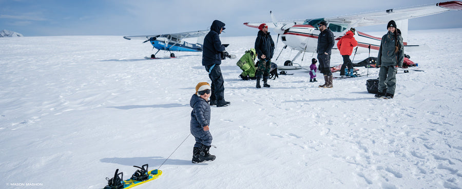 The crew enjoying some quality family time in the mountains after Malone Mashon, age 2, potentially became the youngest snowboarder ever to complete an Alaskan first descent. Photo: Mason Mashon