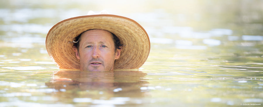Forrest near his home in the mountains above Ojai, CA, enjoying an afternoon cool down in his local swimming hole in July, 2024. Photo: Colin Wiseman