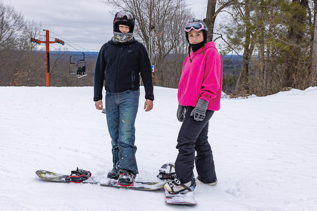 I met these two on the chairlift. She’s helping her boyfriend learn how to snowboard. He opts not to wear gloves.