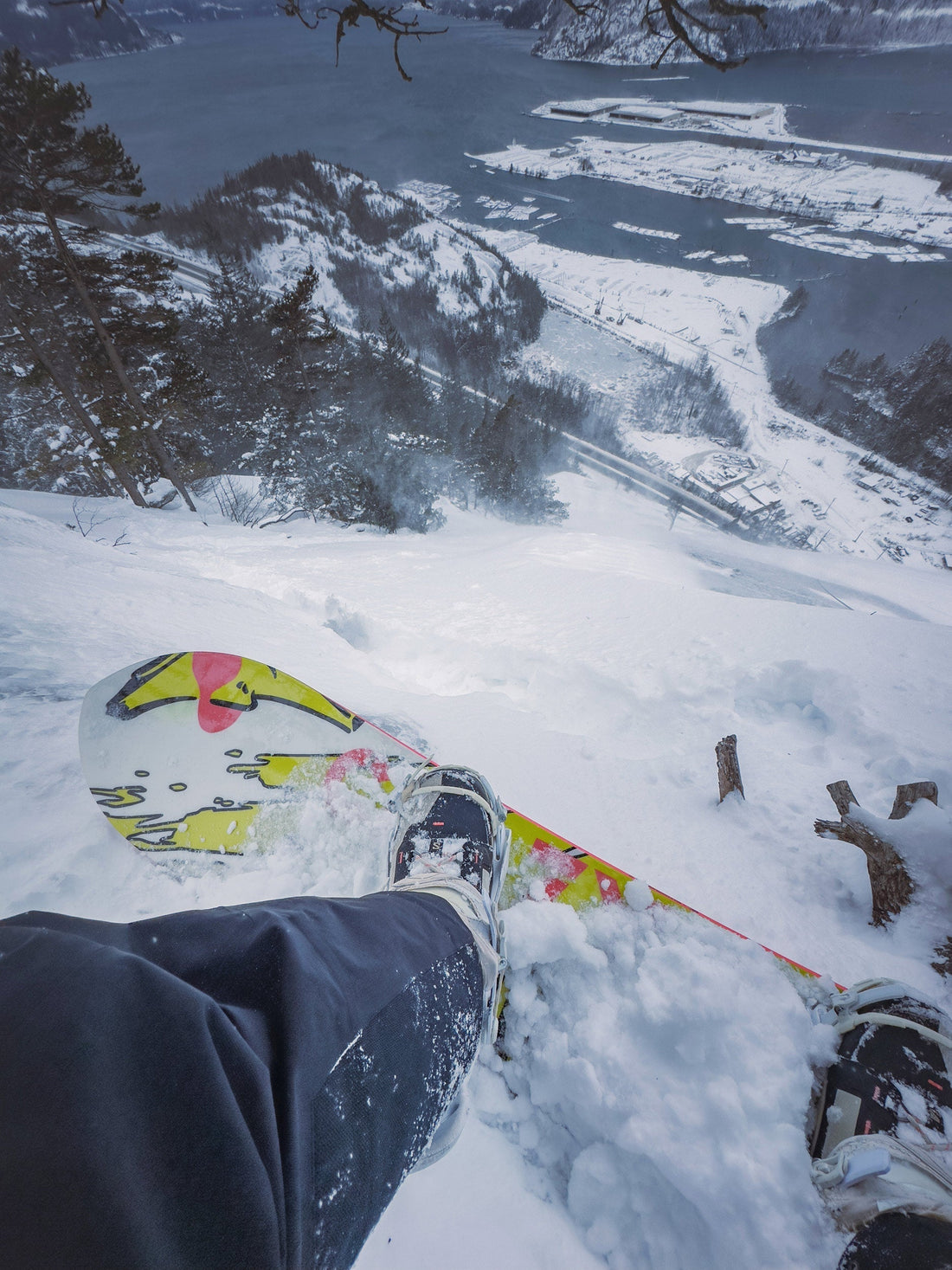 Kieran Brownie finds an unlikely heel edge on the Stawamus Chief, with the Howe Sound inlet below.