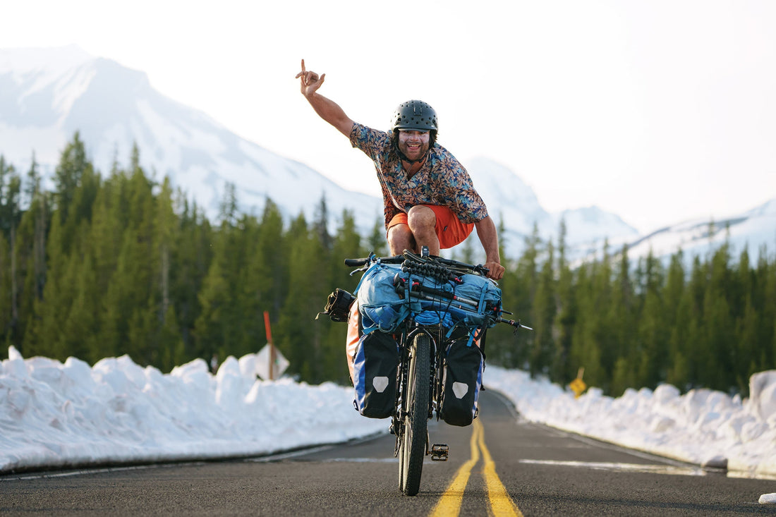 Stratton Matteson hanging 10 along the Cascade Lakes Highway in the Three Sisters Wilderness, OR, during his 103-day Sierra to Baker bike tour, May 2021. Photo: Colton Jacobs